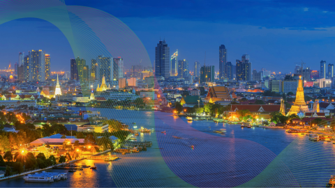 An image of the Bangkok skyline at night with a spectral gradient overlaid. 